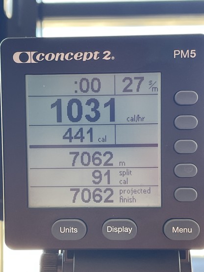Display of a Concept2 PM5 monitor showing workout statistics including time, pace, distance, and calories burned.