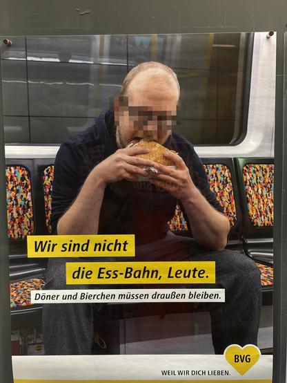 Mann isst Burger in der U-Bahn. Text: "Wir sind nicht die Ess-Bahn, Leute. Döner und Bierchen müssen draußen bleiben." BVG-Logo.