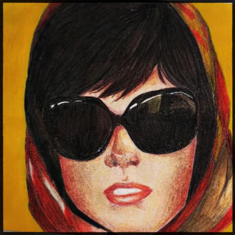 A close-up colored pencil/pastel portrait of a woman with dark, sleek bangs and large oversized round dark sunglasses that dominate the upper half of her face. She wears bold red lipstick and has a striped red-and-gold headscarf framing her face, set against a solid mustard-yellow background. The style is graphic and glossy, with a retro, pop-art feel reminiscent of 1960s fashion photography.