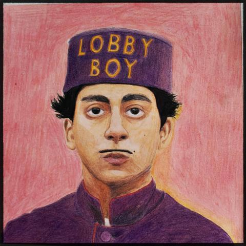 This is a colored pencil portrait of Zero Moustafa, the lobby boy character from *The Grand Budapest Hotel*. He's depicted in a purple bellhop uniform with red piping and a matching pillbox hat that reads "LOBBY BOY" in gold lettering. He has dark, tousled hair, dark eyes, and a serious, direct expression, set against a warm pink and orange gradient background. The style closely mimics Wes Anderson's symmetrical, saturated aesthetic from the film.
